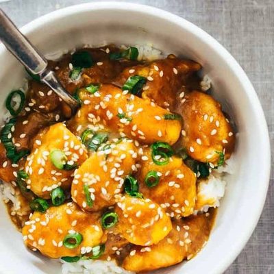 Sesame Mango Chicken Teriyaki in bowls with rice.