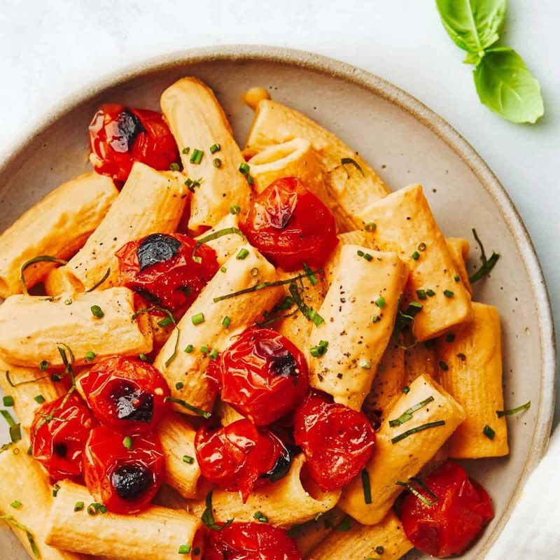 A picture of Creamy Vegan Red Pepper Pasta with Blistered Tomatoes