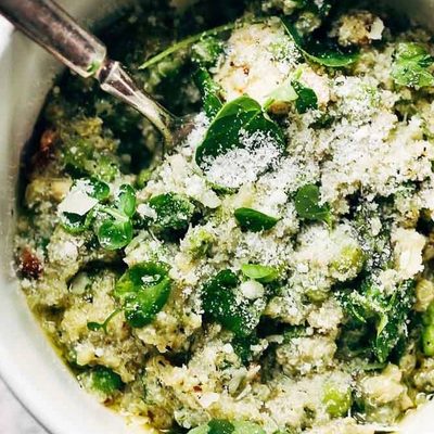 Crockpot Quinoa Chicken Primavera in a bowl with fork.