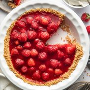 Strawberry pie in a plate.