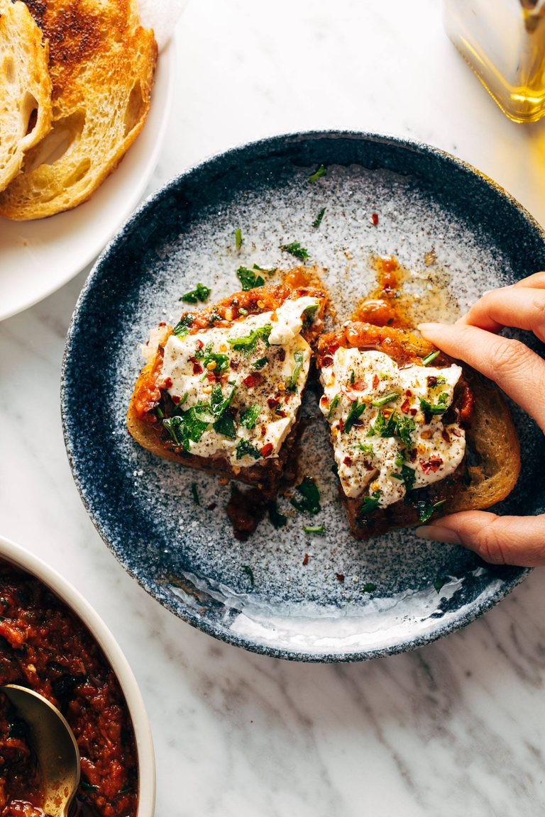Zaalouk toasts on a plate.